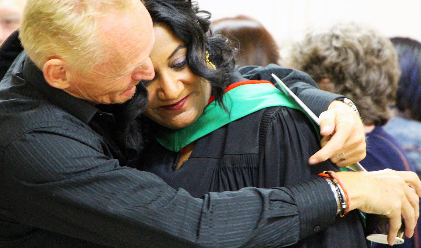 Graduate getting a hug